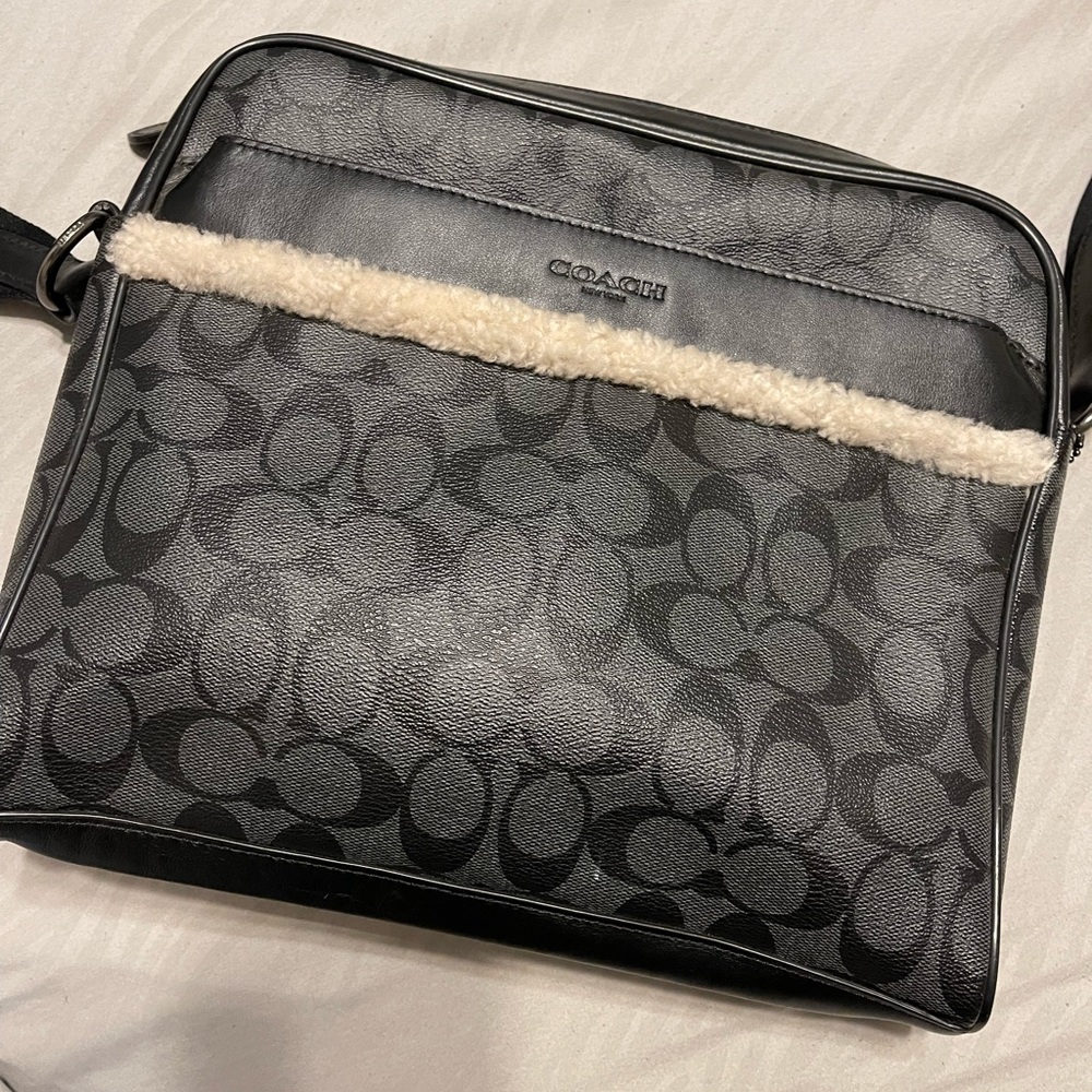 Coach crossbody bag with adjustable straps.